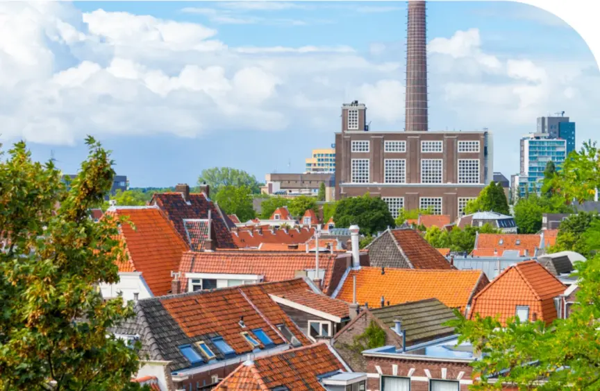 Image of terracotta rooftops in a European city
