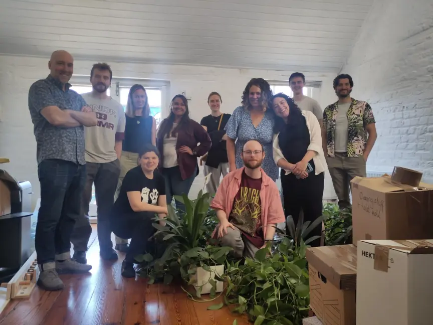Picture of Codema staff in empty office as they get ready to leave the old Temple Bar office.
